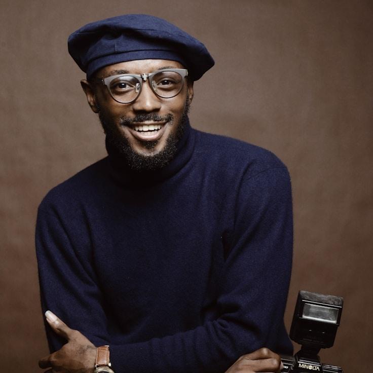 Kai Nakamura, Client Relations Director, discussing corporate gifting strategy with business clients